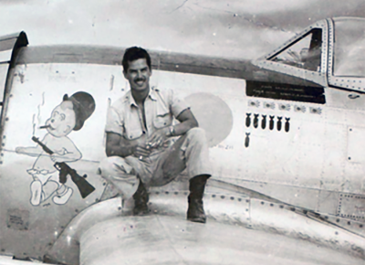 Oscar Perdomo on the wing of his P-47. 